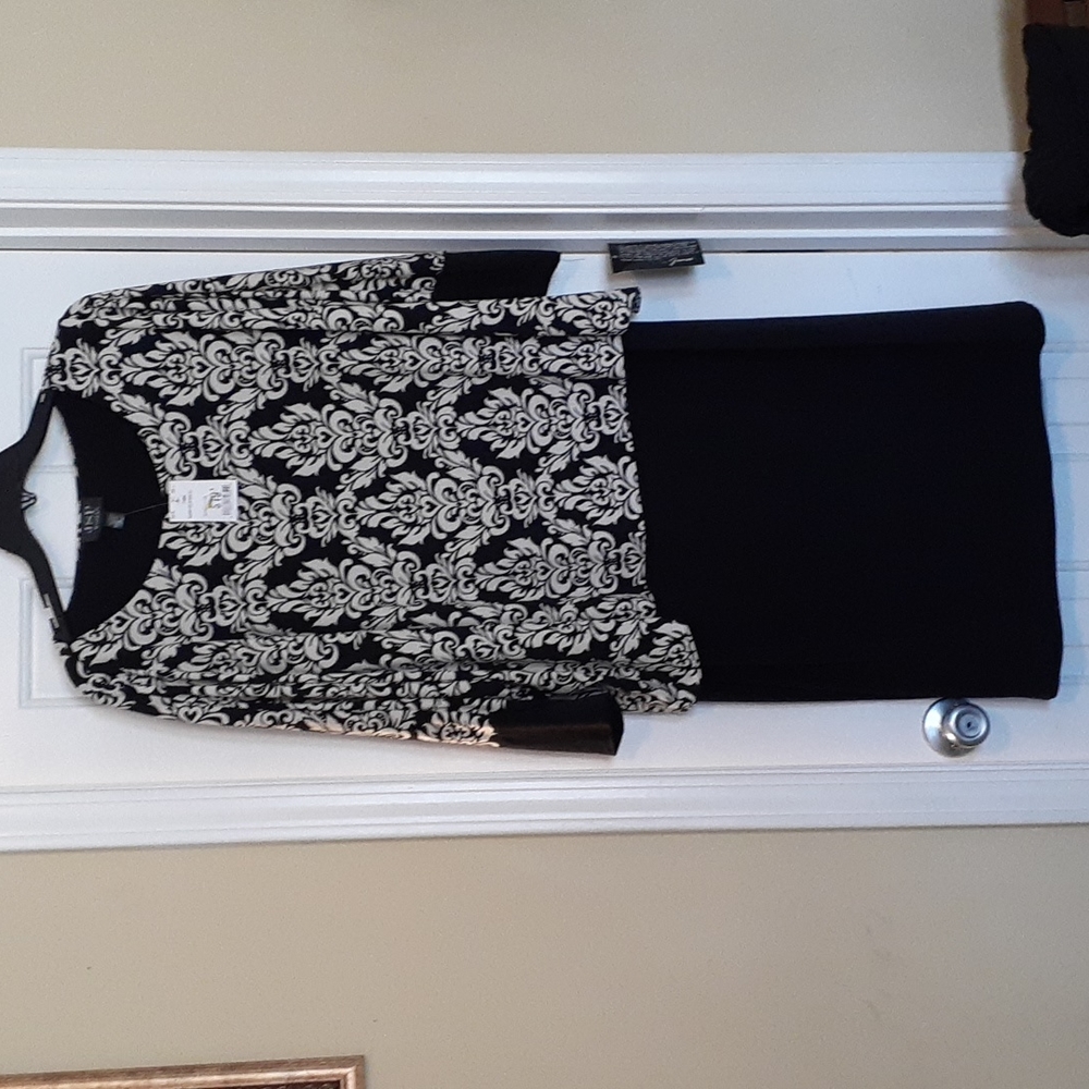 A black dress/attached top